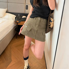 Military green workwear denim skirt and pants for women in the summer of 2026, featuring a slimming design with multiple pockets and anti glare A-line skirt