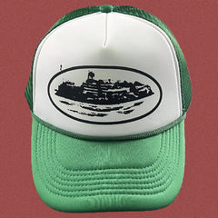 Corteiz Vintage Green and White Trucker Hat with Oval Cruise Ship Graphic