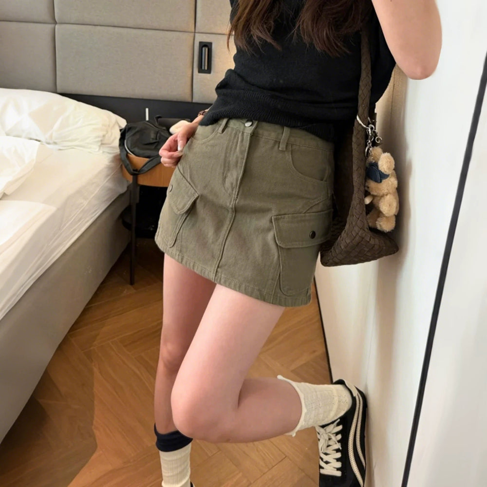 Military green workwear denim skirt and pants for women in the summer of 2026, featuring a slimming design with multiple pockets and anti glare A-line skirt