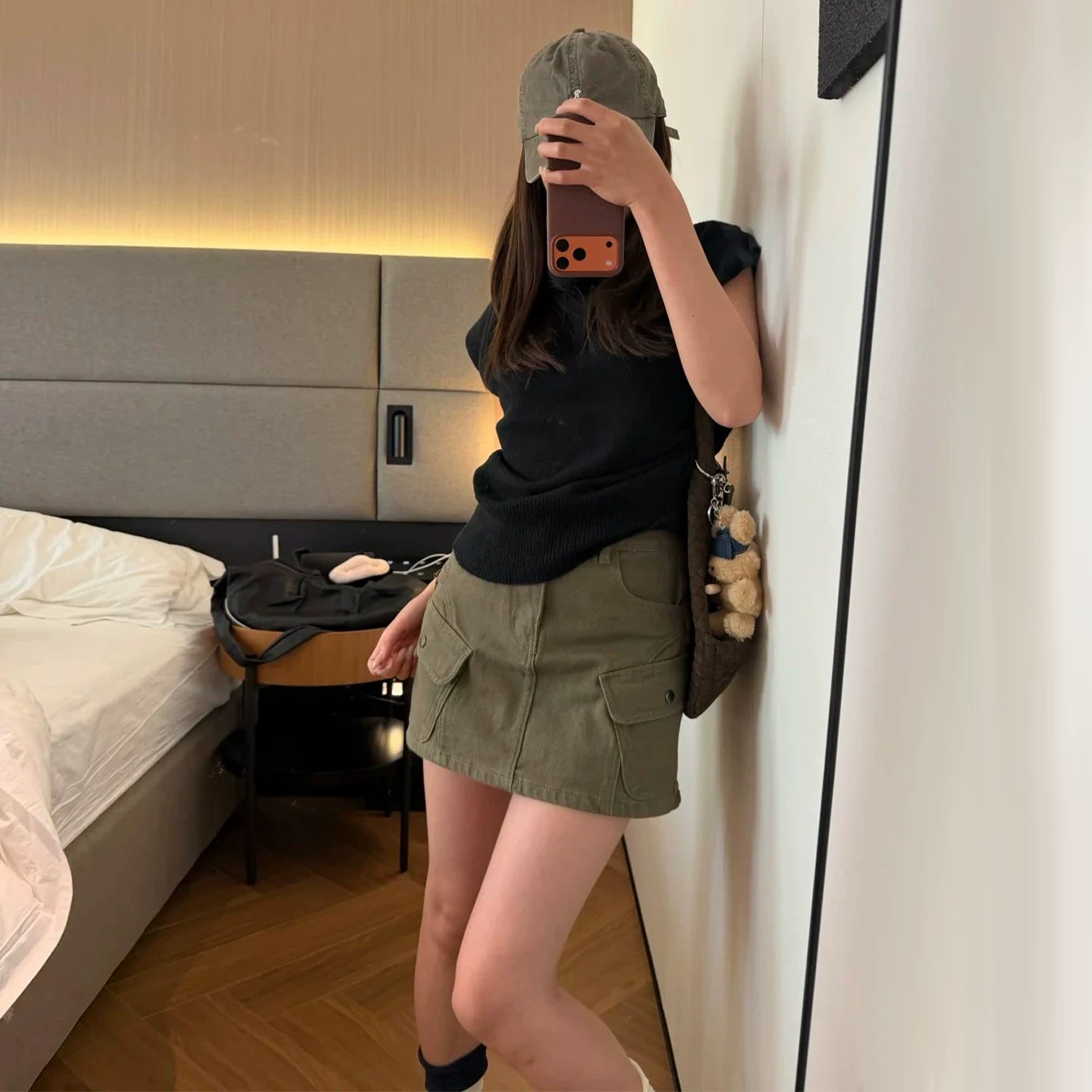 Military green workwear denim skirt and pants for women in the summer of 2026, featuring a slimming design with multiple pockets and anti glare A-line skirt