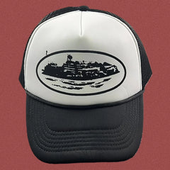 Cortiez Bold Black Oval Ship Logo Trucker Hat - White