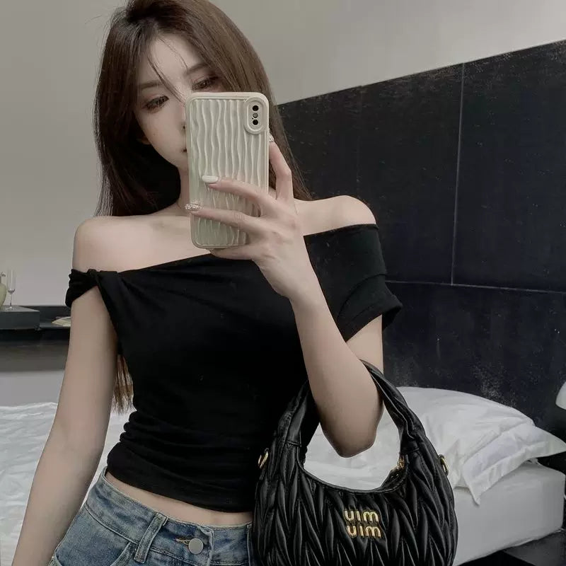 Sexy spicy girl style slanted shoulder straight neck ins short sleeved T-shirt for women, summer black slim fit off shoulder design, niche top