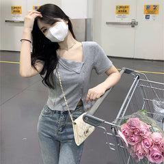 Foreign trade clearance Korean version spicy girl short sleeved t-shirt women's summer pure cotton irregular slit shoulder chic short top