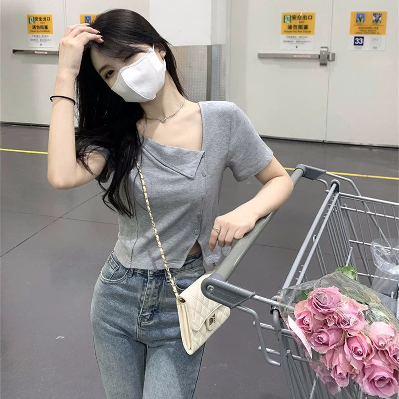 Commuting style spicy girl slanted neck short sleeved T-shirt for women, American style slim fit and slimming button design, niche short top for women's clothing
